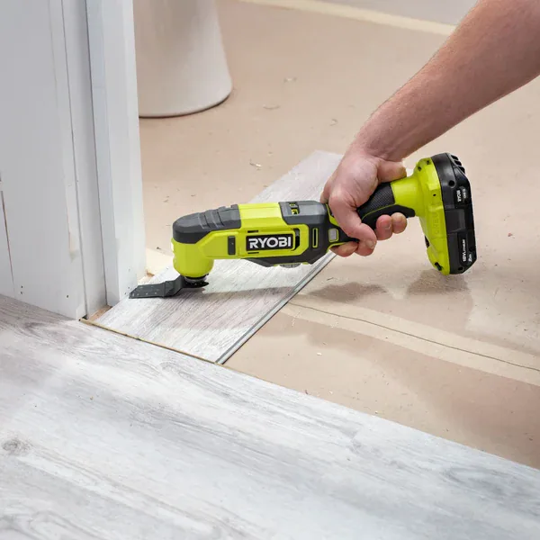 Oscillating tool cutting trim